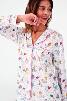 If "sleep" is on your birthday list, consider it done. The Long Sleeve Polo PJ Set is a classic cotton pajama set covered in party animals and yummy cakes. You deserve to celebrate, even if it's not your birthday. Button Front Closure Functional Breast Pocket Mid-Rise Elastic Waist Materials and Care 100% Premium Cotton Machine Wash Cold, With Like Colors Do Not Bleach, Tumble Dry Low (Line Dry Recommended) Imported Measurement Information Model Wears Size Small Size S Length: 25" (from Shoulder) Size S Sleeve Length: 24" (from Shoulder) Size S Inseam: 28.5" Size S Front Rise: 12.5” Womens Lounge Set, Birthday Button, Rabbit Birthday, Rabbit White, Cotton Pajama Set, Cute Pjs, Roller Rabbit, Best Pajamas, Party Animals