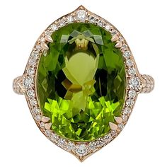 A natural and eye clean 10.03ct Peridot is the star of this ring. The striking green is designed with a halo of diamonds featuring pointed edges. The under mounting of this ring was also designed intricately in a floral motif completed by a rounded paved band. Its all about the details and set in 18K rose gold. Our diamonds are natural and we use top quality G VS only. This ring is in a size 7 and can be resized. This piece of jewelry comes certified and also comes with an original certificate o Luxury Green Marquise Diamond Ring, Luxury Green Halo Diamond Ring, Green Luxury Halo Diamond Ring, Luxury Green Gemstone Halo Ring, Luxury Green Diamond Ring With Halo Design, Thai Modern, Soul Contract, Gold For Sale, Yellow And Purple