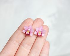 Miniature stud earrings with light pink orchid flowers. Suitable for every day. Flowers are made by hand from polymer clay, not fragile, not afraid of water. *   *   *    *    *    *    *    *    *    *    *    *    *    *   The earrings in the photos have been SOLD.  You will receive a repeat of these earrings.  As this is a handmade item, each new item may vary slightly, but the overall look will be the same as that shown in the photo. Please pay attention to the timing of jewelry making *   * Pink Flower-shaped Polymer Clay Earrings, Pink Flower Shaped Polymer Clay Earrings, Handmade Pink Flower Earrings In Polymer Clay, Pink Handmade Flower Polymer Clay Earrings, Pink 3d Flower Polymer Clay Earrings, Pink Polymer Clay Flower Earrings, Pink Polymer Clay Flower Earrings For Gift, Pink Polymer Clay Earrings With 3d Flowers, Small Pink Flowers