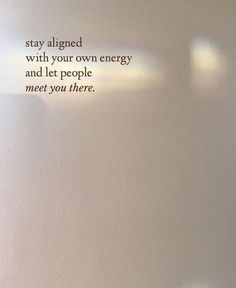 a white wall with the words stay aligned and your own energy and let people meet you there