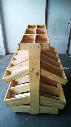 a large wooden crate sitting on top of a floor