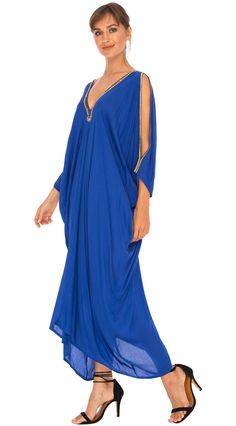 Feeling sexy has never been so easy. Simply toss on this long kaftan dress and wear out for many occasions. Don't forget to pack it on your next beach vacation. It is lightweight with cold shoulder sleeves. Delicate hand sewed gold beading along the deep V neckline. Get your flirt on! Semi-sheer Hand Sewed gold beading Made from lightweight rayon Hand wash cold, hang to dry Traveling Woman, Cruise Clothes, Long Kaftan Dress, Kaftan Tops, Long Kaftan, Beaded Neckline, Floral Kimono, Kaftan Dress, Cover Up Dress