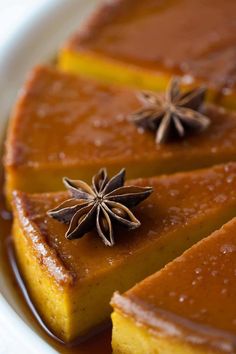 slices of pumpkin cheesecake with anise on top