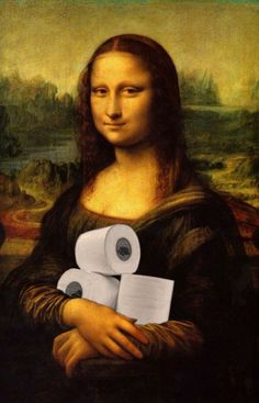 the monaine holding two rolls of toilet paper