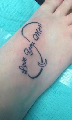 a person's foot with a tattoo on it that says, you are one