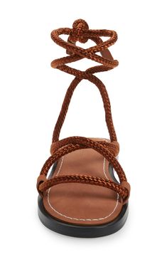 Swap the straps to switch up your look in these sandals with a set of woven laces and a set of longer, leg-wrapping leather laces. 1/2" heel Leather and textile upper/leather lining/rubber sole Imported Spring Sandals With Braided Trim And Adjustable Fit, Leather Sandals With Braided Trim, Adjustable Strapped Lace-up Sandals, Brown Strappy Lace-up Sandals, Brown Leather Sandals With Ankle Tie, Brown Leather Ankle Tie Sandals, Brown Adjustable Lace-up Sandals, Brown Sandals With Braided Ankle Straps, Adjustable Strappy Sandals With Braided Straps