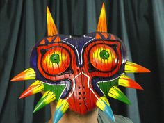 "Legend of Zelda Wearable Majoras Mask Replica !! *This amazing mask will surprise anyone, It is 3D printed and Hand painted with great detail. Great for Cosplay, Halloween, or Festivals. Using artist quality acrylics, we paint this mask to resemble the one and only Majora's mask. Every mas is unique and no 2 are the same, yet all amazing and made specially for you. For easier visibility the mask has 2 sets of holes, eye holes and right below it with a bigger size set. *Details: ♦Eyes: 2 Sets - Deku Mask, Zelda Cosplay, The Ancient One, Majoras Mask, Halloween Mask, Cosplay Halloween, Cosplay Props, Painting Videos, Halloween Masks