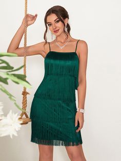 Reminiscent of the raucous '20s, this fringed mini skirt is the perfect way to show off your dancing legs. The uniqueness of this dress is its lightness and short hem, which can be worn at any party.

Tassel
Back Zip

Spaghetti Straps
Bodycon
Cocktail Dress, Party Dress

Size: