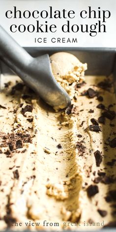 chocolate chip cookie dough in a baking pan with a spatula scooping ice cream