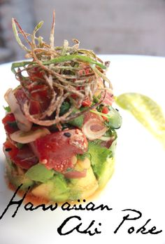 a close up of a plate of food with the words hawaiian poke written below it