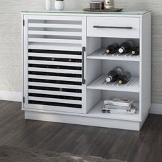 a white cabinet with wine bottles in it