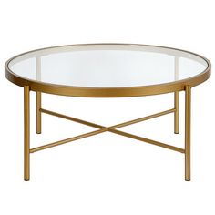 an oval glass coffee table with gold metal legs and a round glass top, viewed from the front