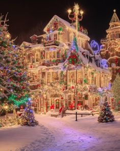 a large house covered in christmas lights and decorations