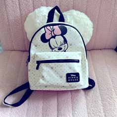 New Minnie Mouse Pink/White Color Small Backpack. Dimensions 9.5" L X 11.5" H X 5" D. Adjustable Straps Disney White Bags For Disney Trips, White Disney Backpack For School, Disney White Backpack For School, Disney Minnie Mouse White Bag, White Mickey Mouse Backpack For Travel, White Mickey Mouse Backpack For Disney Trips, Cute Minnie Mouse Backpack For Daily Use, White Mickey Mouse Travel Backpack, White Minnie Mouse Bag For Daily Use