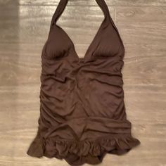 Brown Halter One Piece Swimsuit With Attached Mini Skirt, Full Coverage, Padded Bra, No Wires Like Brand New!!! Only Worn 1 Time Fitted One-piece Halter Top For Poolside, Chic Solid Color Tankini For Party, Fitted One-piece Lined Halter Top, Fitted Halter Top With Lined Body, Chic Fitted One-piece Halter Top, Lined One-piece Party Tankini, Solid Fitted Tankini For Party, Chic Fitted Tankini For Party, Solid Color Fitted Tankini For Party