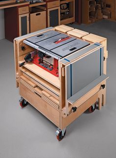 a workbench with drawers and tools in it