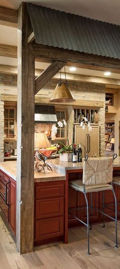 a kitchen with wooden floors and an island