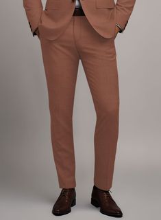 Prepare to embrace the power of elegance and confidence with our Marco Stretch Chestnut Wool Pants – an investment that eloquently expresses your impeccable taste. Crafted from Superfine 150's Wool, these pants offer unparalleled comfort and durability, featuring a solid pattern for classic charm. The chestnut shade, with its earthy undertones, complements a variety of skin tones and seamlessly transitions between seasons, ensuring you make a striking impression year-round. Whether in natural da Slim Fit Dress Pants For Fall, Slim Fit Business Pants For Fall, Business Slim Fit Pants For Fall, Fall Business Slim Fit Pants, Fall Business Slim Fit Bottoms, Brown Tailored Tapered Leg Bottoms, Slim Fit Brown Dress Pants For Business, Tailored Brown Bottoms With Tapered Leg, Brown Slim Fit Dress Pants For Business