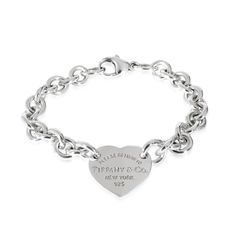 Tiffany & Co. Return To Tiffany Bracelet In Sterling Silver Silver / Bracelet Tiffany & Co. Luxury White Gold Bracelets With Silver-tone Logo, Elegant Silver Bracelet With Logo Charm, Classic Bracelets With Logo Charm As A Gift, Classic Bracelets For Valentine's Day, Classic Bracelets For Valentine's Day Formal Occasion, Classic Formal Bracelets For Valentine's Day, Elegant Jewelry With Silver-tone Logo Plaque As Gift, Classic Engraved Bracelets For Valentine's Day, Return To Tiffany Bracelet