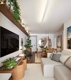 a living room filled with furniture and a flat screen tv mounted on a wall next to a wooden table