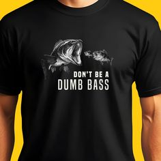 This funny bass fishing shirt was designed by me--an avid angler--for fellow anglers! With a cool bass fishing themed design, I pour my love for catching bigmouth and smallmouth into every graphic tee to bring you the best bass fishing apparel. It's also a PERFECT birthday gift or Christmas present for any man who love fishing, whether he's a husband, dad, or grandpa. - Shirts are made to order just for you, which is why we don't accept returns or exchanges. Please review the color and size charts before placing your order. If you have any questions, feel free to message us for clarification on sizing or colors. ### Product Information ### -  All of the products are printed and shipped from the USA. -  We use Gildan 5000 tees made from 100% soft, ethically sourced cotton, ensuring comfort Id Rather Be Fishing Shirt, Casual Black T-shirt For Fishing, Bass Fishing Shirts, Cheap Casual T-shirt For Fishing, Graphic Tee T-shirt For Fishing, Graphic Tee Short Sleeve T-shirt For Fishing, Fishing Theme, Fishing Outfits, Best Fishing