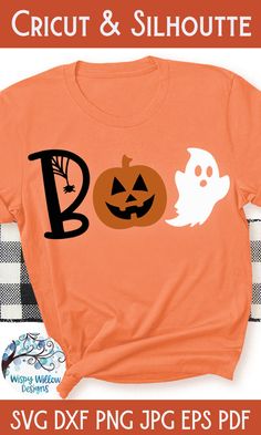 an orange t - shirt with the word boo on it and two pumpkins next to each other