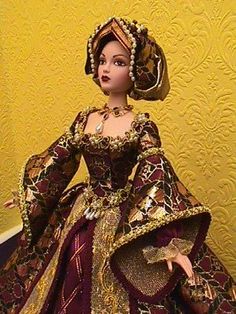 a doll dressed in an elaborate dress