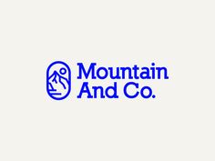 the mountain and co logo is shown in blue on a white background, with an image of a man's head