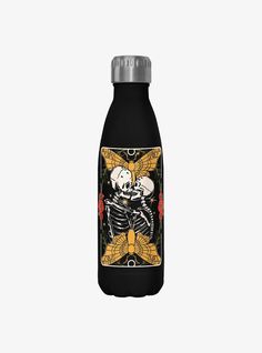 a black bottle with a skeleton holding a skull on it's back and the words,