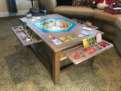 a coffee table that has some cards on it