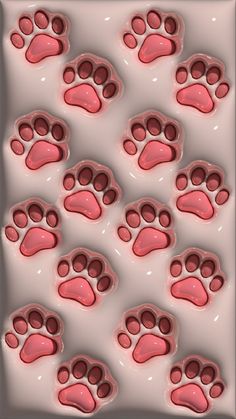 an animal's paw prints are shown in pink and white, as well as the background