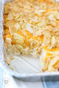 a casserole dish with cheesy potato chips in it