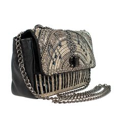 Mary Frances All Keyed Up Convertible Crossbody Handbag Beaded Piano Bag New Style and functionality combine in this beaded music themed handbag that features a crossbody chain strap that can be doubled-up to wear over the shoulder. It's leather box shape body provides plenty of room for all your essentials and the turn lock clasp keeps them all safe and secure. 7.5 x 2 x 5" Strap Length End to End: 27"/49.5" Strap Drop: 13"/25" Non-removable convertible shoulder/crossbody chain strap, turn lock Luxury Beaded Clutch Shoulder Bag, Chic Beaded Crossbody Shoulder Bag, Luxury Beaded Bags For Everyday Use, Beaded Crossbody Shoulder Bag For Evening, Beaded Evening Crossbody Bag, Evening Beaded Crossbody Bag, Luxury Beaded Shoulder Bag For Fashion, Chic Beaded Bags For Night Out, Elegant Embellished Shoulder Bag For Travel