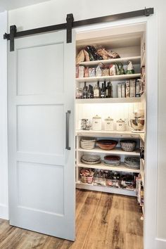 an open pantry with lots of food in it