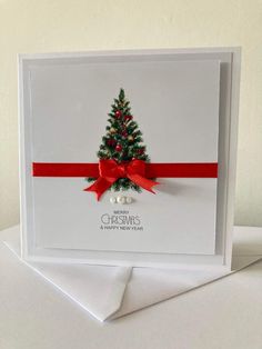 a card with a christmas tree on it