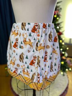 "Lounge around this holiday season in the cutest comfiest shorts!  Soft flannel with festive woodland critters. Sweet yellow plaid flannel accent.  Elastic waist: 32\"-40\" Hip max: 48\" Inseam: 2 3/4 Length from waist: 14\" Perfect for sleeping and wrapping gifts!  Wake up feeling cute in these adorable shorts!  Handmade by me in my home studio.  Can be custom ordered in all sizes and various fabrics." Cute Comfy Shorts, Animal Pajamas, Woodland Critters, Brunch Dress, Wrapping Gifts, Special Dresses, Cozy Flannel, Sleep Shorts, Apron Pockets