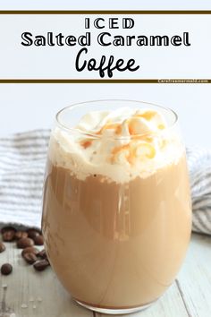 iced salted caramel coffee in a glass with whipped cream on top