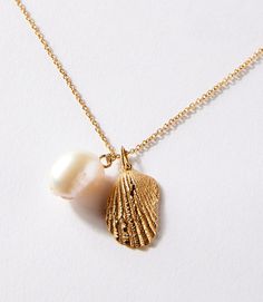 Gold Gold Plated Shell And Pearl Necklace | Karen Kane Shell And Pearl Necklace, Seashell Pendants, Seashell Jewelry, Seashell Necklace, Gold Pearl Necklace, Karen Kane, Natural Elements, Shell Necklaces, Silver Stars