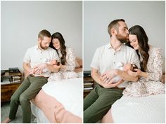 a man and woman cuddle while sitting on a bed with their baby in her arms