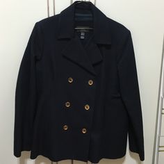 Navy Blue Jacket/Blazer With 3 Gold Colored Buttons On Each Side. Double Breasted. Simple Classic Blazer Jacket 100% Cotton. Never Worn, In Great Condition, Brand New. Shoulder To Bottom Of Sleeve 24-24.5 Inches. Side To Side Of Chest 19.5-20 Inches, From The Shoulder Down To The Bottom Of The Jacket About 28 Inches. This Great Classy Blazer / Jacket That Can Dress Up Jeans Or Just Keep The Classy Dressy Look Going, It’s A Great Piece For Any Look You’re Going For Reasonable Offers Considered Blue Buttoned Career Outerwear, Career Blue Buttoned Outerwear, Navy Long Sleeve Peacoat For Office, Career Blue Outerwear With Buttons, Navy Peacoat For Workwear, Navy Peacoat For Work, Navy Long Peacoat For Work, Spring Navy Peacoat For Office, Blue Long Sleeve Career Outerwear