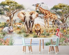 an elephant, giraffe, zebra and other animals in a jungle scene wall mural