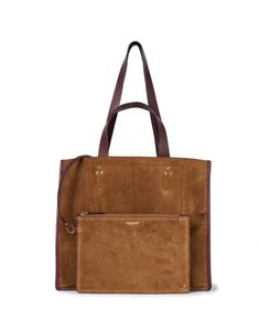 Jerome Dreyfuss's Leon bag is the ideal fall carryall. Crafted from luxurious suede, this boxy bag features an interior zipper pocket and two sets of handles for versatility. Take it with you on your next getaway as a fashionable yet functional everyday bag. Suede Tote Shoulder Bag With Leather Trim, Brown Suede Bag With Detachable Handle, Brown Suede Bag, Distressed Brown Everyday Bag, Rectangular, Suede Tote Shoulder Bag With Gold-tone Hardware, Brown Suede Bag With Gold-tone Hardware, Valentines Frames, Boxy Bags, Jerome Dreyfuss