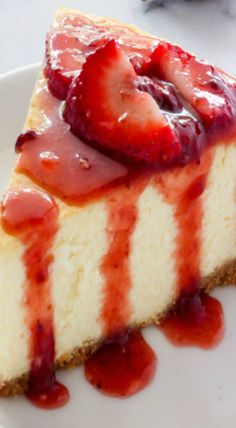 a slice of cheesecake with strawberries on top