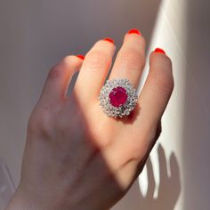 18KT White Gold Oval Ruby + Pave Diamond ring Size 8 Can be resized for an additional fee Large Statement Ring Lovely intricate design This an absolutely lovely attention getting piece! Round and Baguette Diamonds with Oval Faceted Ruby Ring. Approx 4.83 CT Ruby 10.7 x 9.9x 5.7 mm 2.20 CT Diamond Approx 9.8 grams 18KT Stamped Abrasions to the Ruby, which could be polished out by a stone cutter. We can quote for that if need b3, but this ring is so pretty, it really does not need. Check out all o Ballerina Ring, Saint Jewelry, Anniversary Wedding Band, Pave Diamond Ring, Baguette Diamonds, Lovely Ring, Ruby Ring, Baguette Diamond, Intricate Design