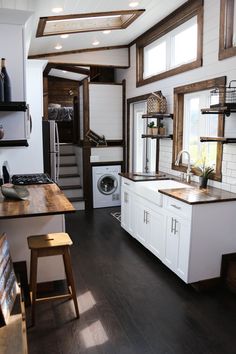 the kitchen is clean and ready to be used as a dining room or living area