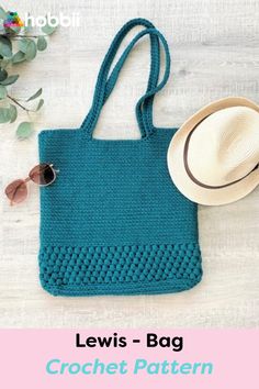 a blue crocheted bag next to a hat and sunglasses on a white table