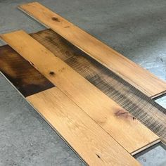 some wood planks are laying on the floor