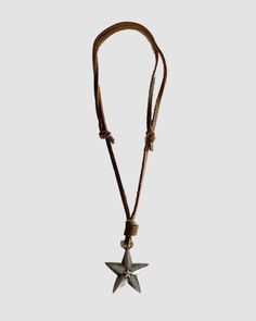 Details: Necklace with leather straps and star pendum Star Charm Necklace For Festivals, Adjustable Vintage Star-shaped Jewelry, Vintage Adjustable Star Jewelry, Vintage Adjustable Star-shaped Jewelry, Casual Adjustable Star Necklaces, Hair Wear, Cold Weather Accessories, Golden Color, Cold Weather