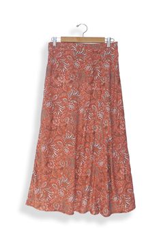 Introducing the Avery Skirt. This flowy, midi length skirt is sure to become a conscious closet staple. Made from a luxurious deadstock rayon fabric in in a beautiful paisley pattern, the Avery skirt will have you feeling stylish in the most effortless way. Featuring a subtle slit on the front left side and an elastic back waistband for ease and comfort. Responsibly Handcrafted from luxurious sustainable fabrics certified Oeko Tex Standard 100.1% of your order funds regenerative carbon offsets H Eco Friendly Clothing, Slip Skirt, Midi Length Skirts, Women Midi, Paisley Pattern, Sustainable Fabrics, Coat Dress, Active Wear Tops, Midi Length