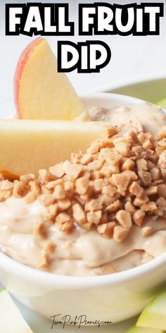 a bowl filled with oatmeal topped with an apple and sliced up apples